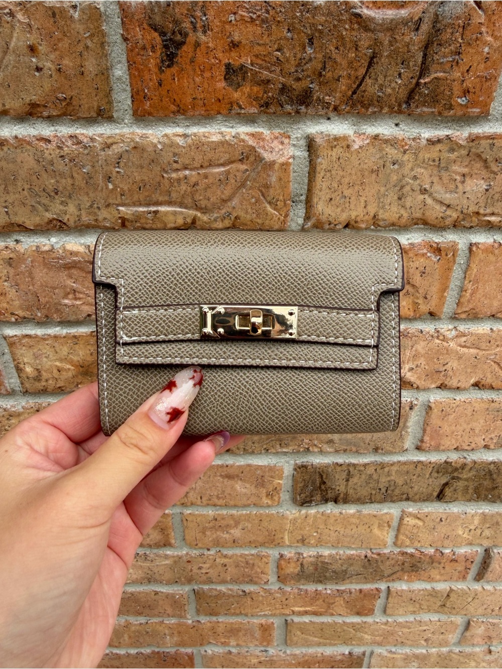 Compact Taupe Leather Wallet with Gold Hardware